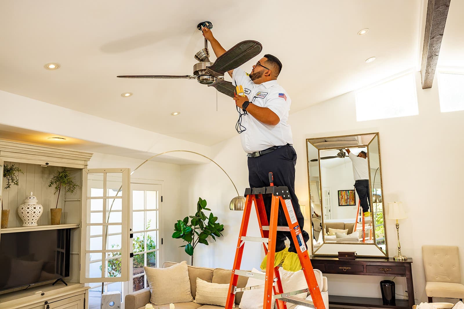 A Home Team Electric electrician diagnosing a circuit in a Coachella Valley home