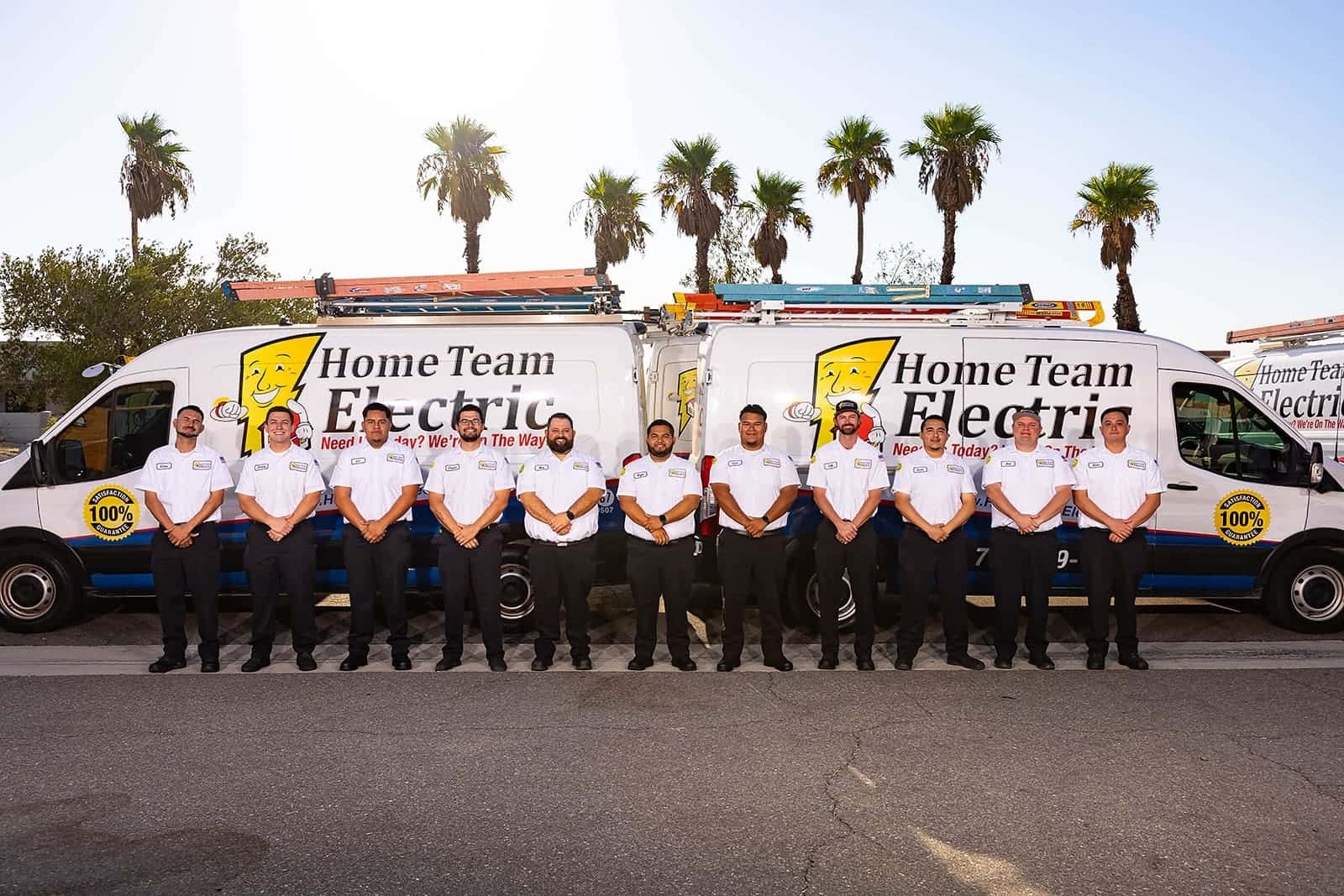 Home Team Electric electricians collaborating on a job site