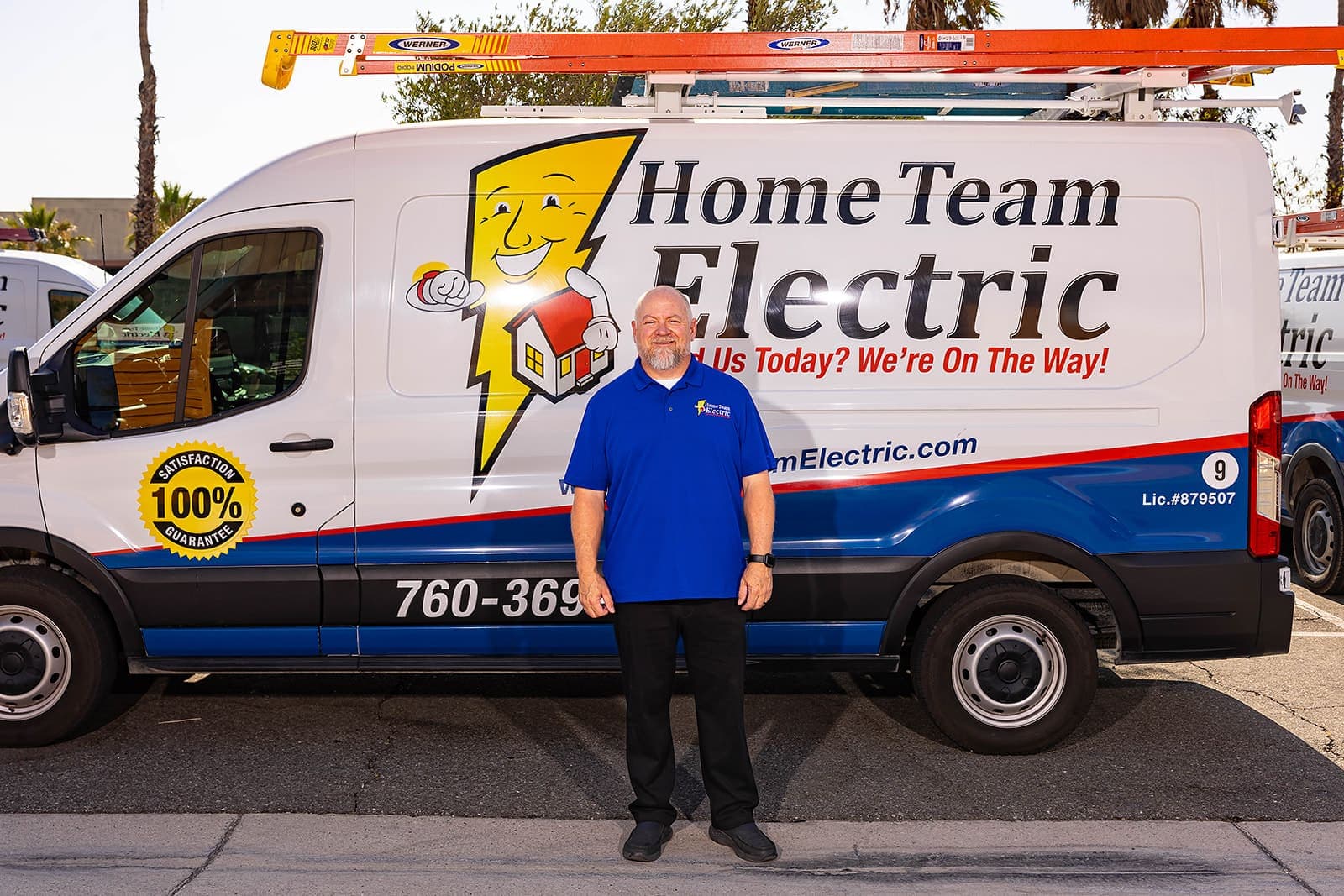Home Team Electric electrician inspecting an electrical panel in a desert home, Coachella Valley California