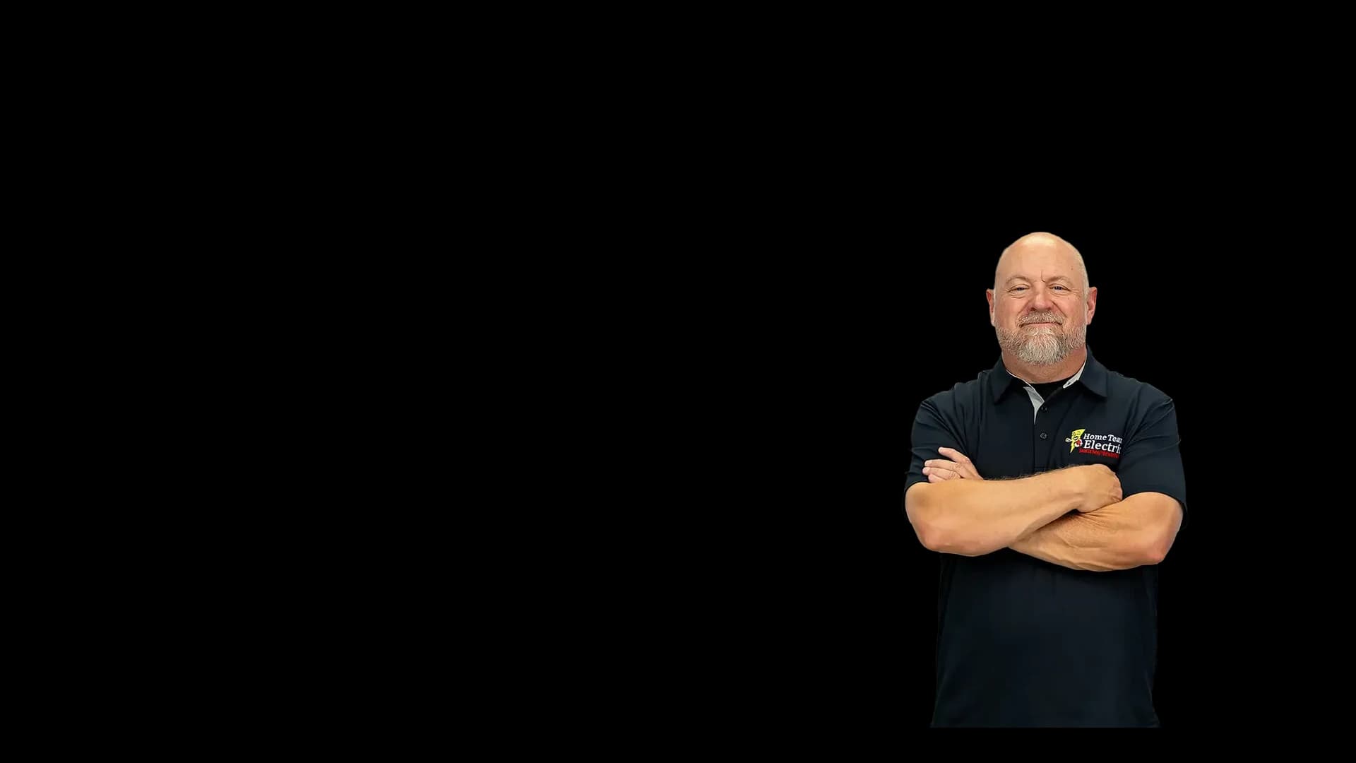 Frank Luersen, smiling Home Team Electric team member in a branded polo