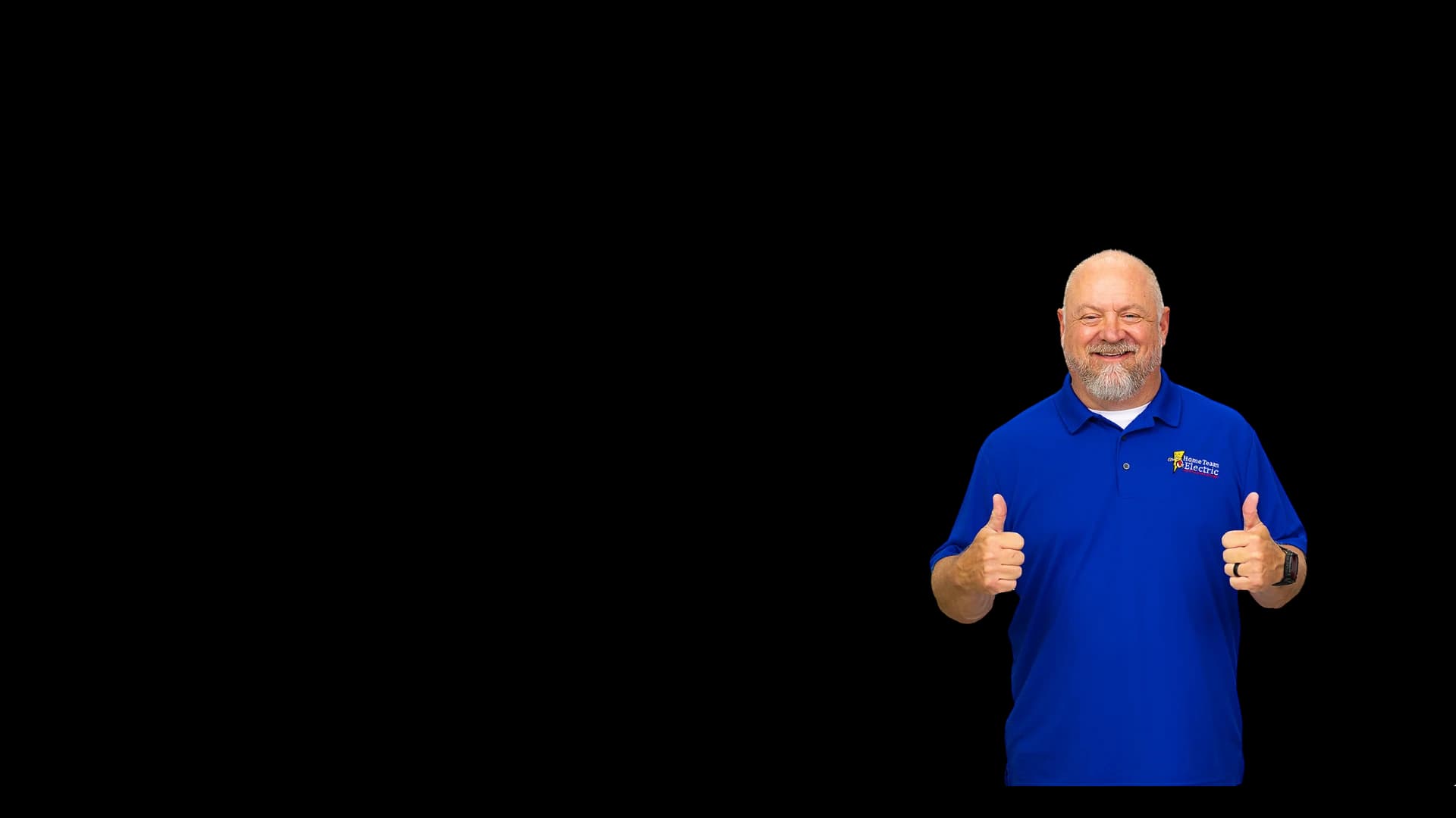 Smiling Home Team Electric team member in a branded polo giving a thumbs up