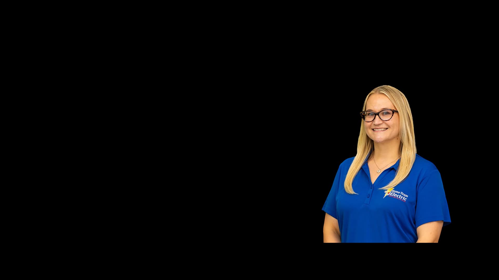 Smiling Home Team Electric team member in a branded polo