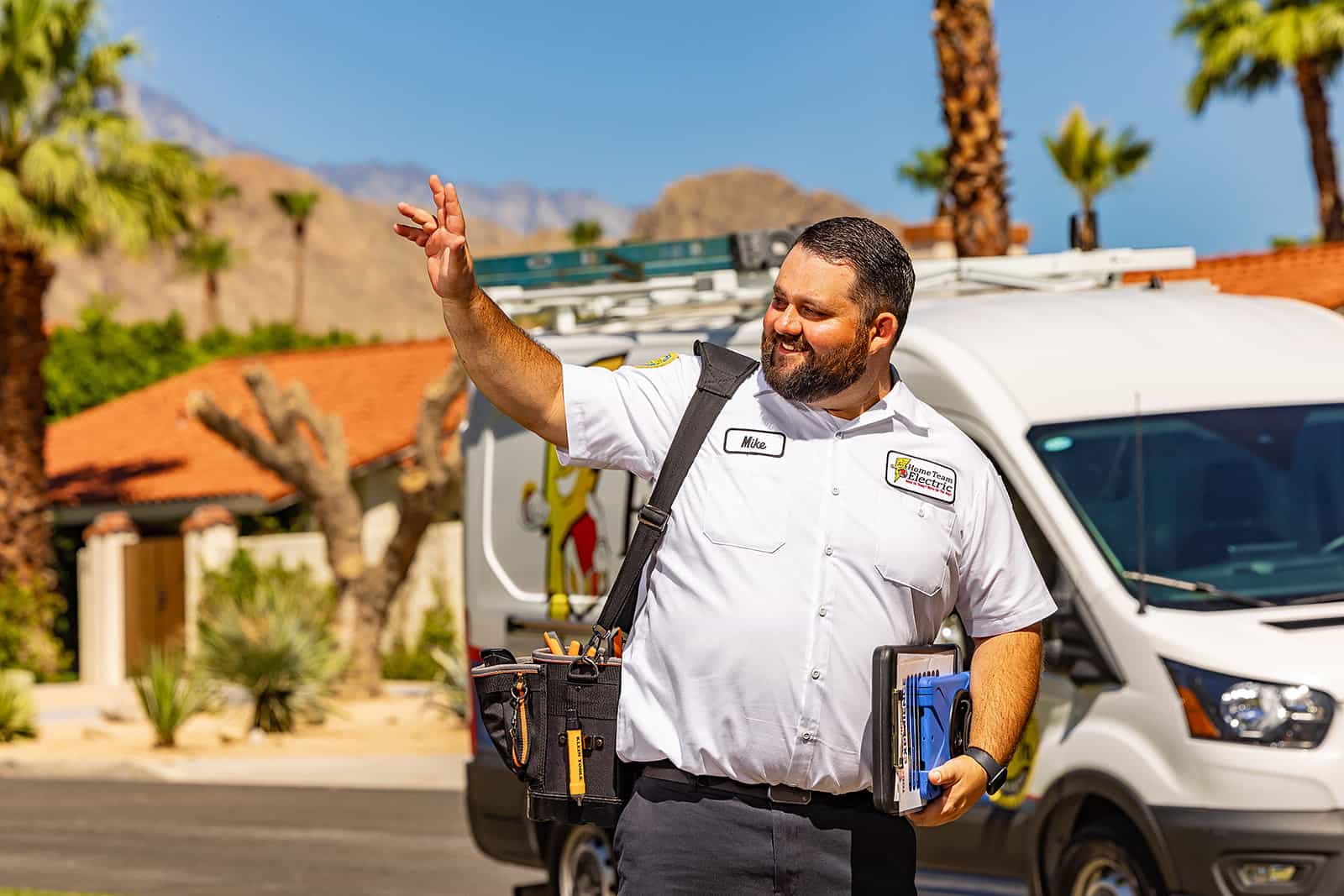 Home Team Electric - Professional team with branded service vans