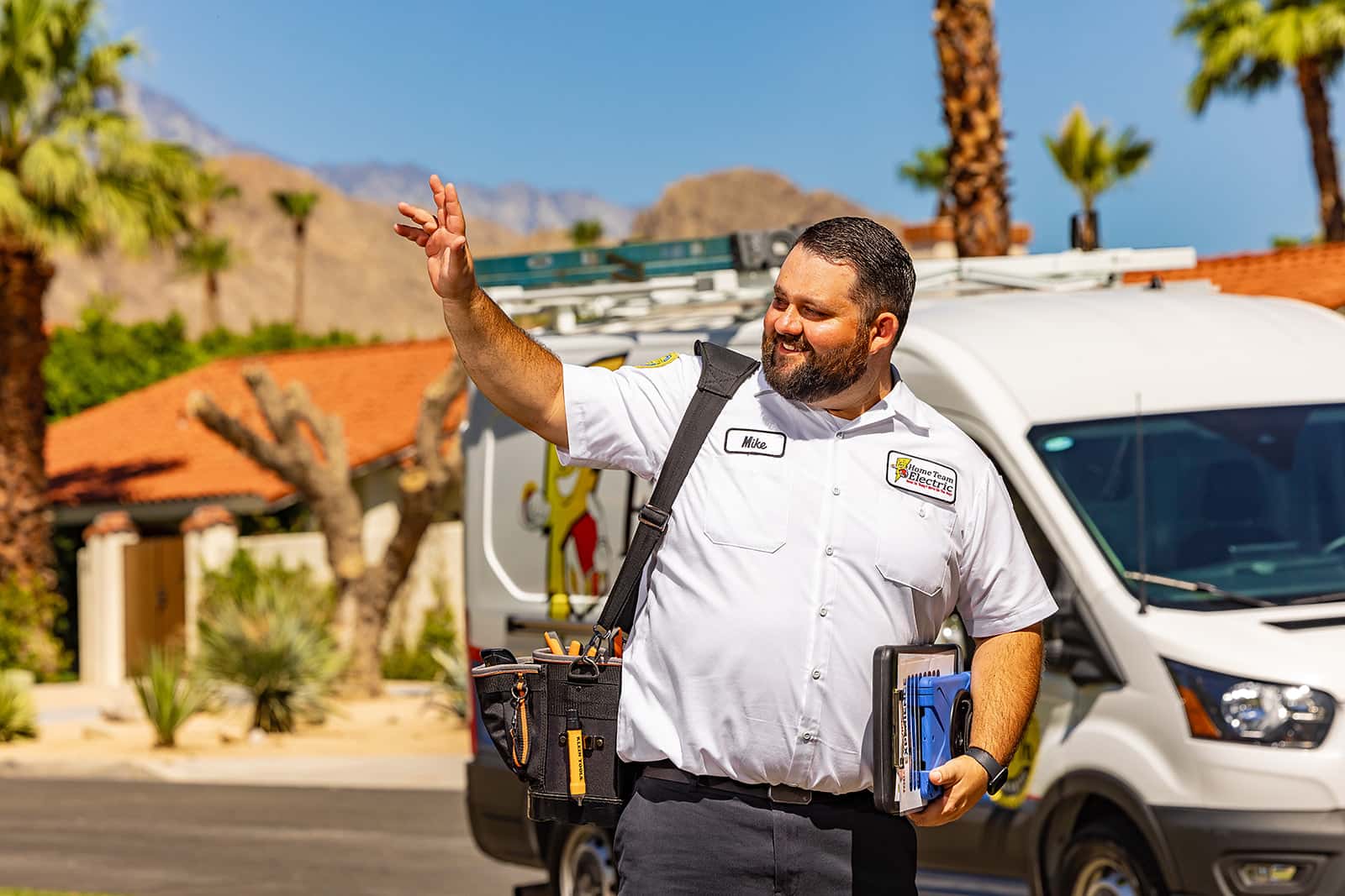 Home Team Electric - Professional team with branded service vans