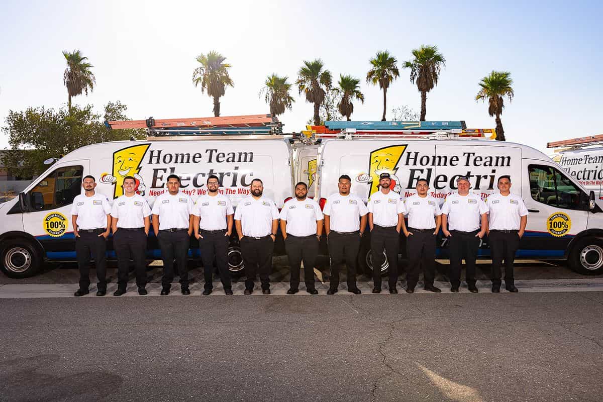 Home Team Electric team with their marked service vans